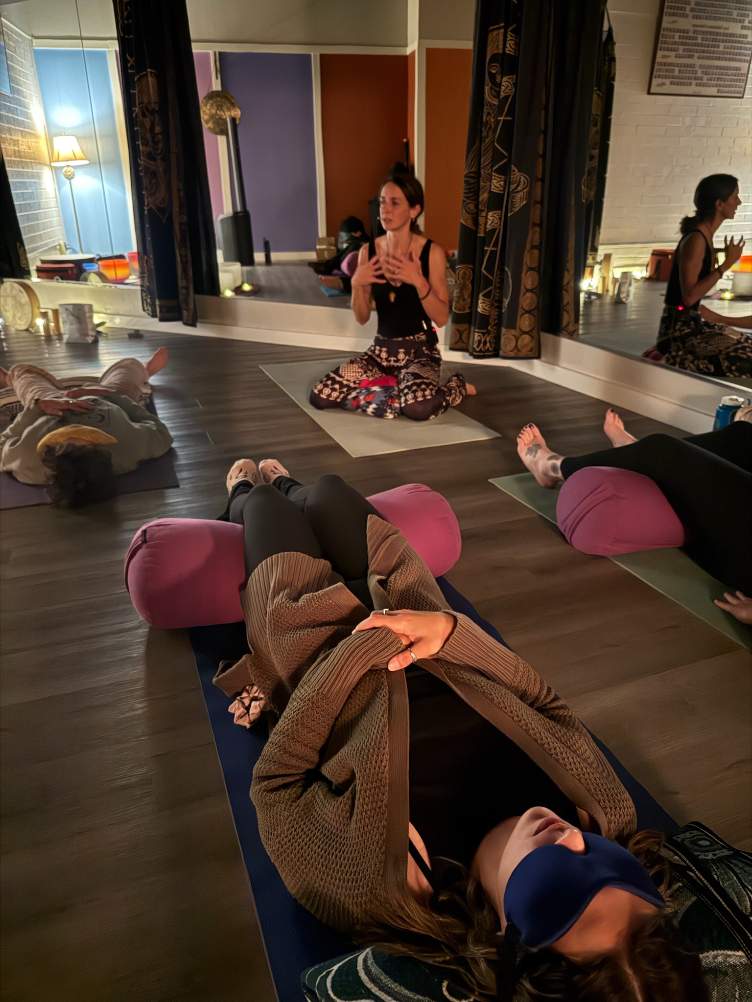 Shelby Von Oepen facilitating Reiki energy healing during Breathwork session at Earth and Herbs Prescott