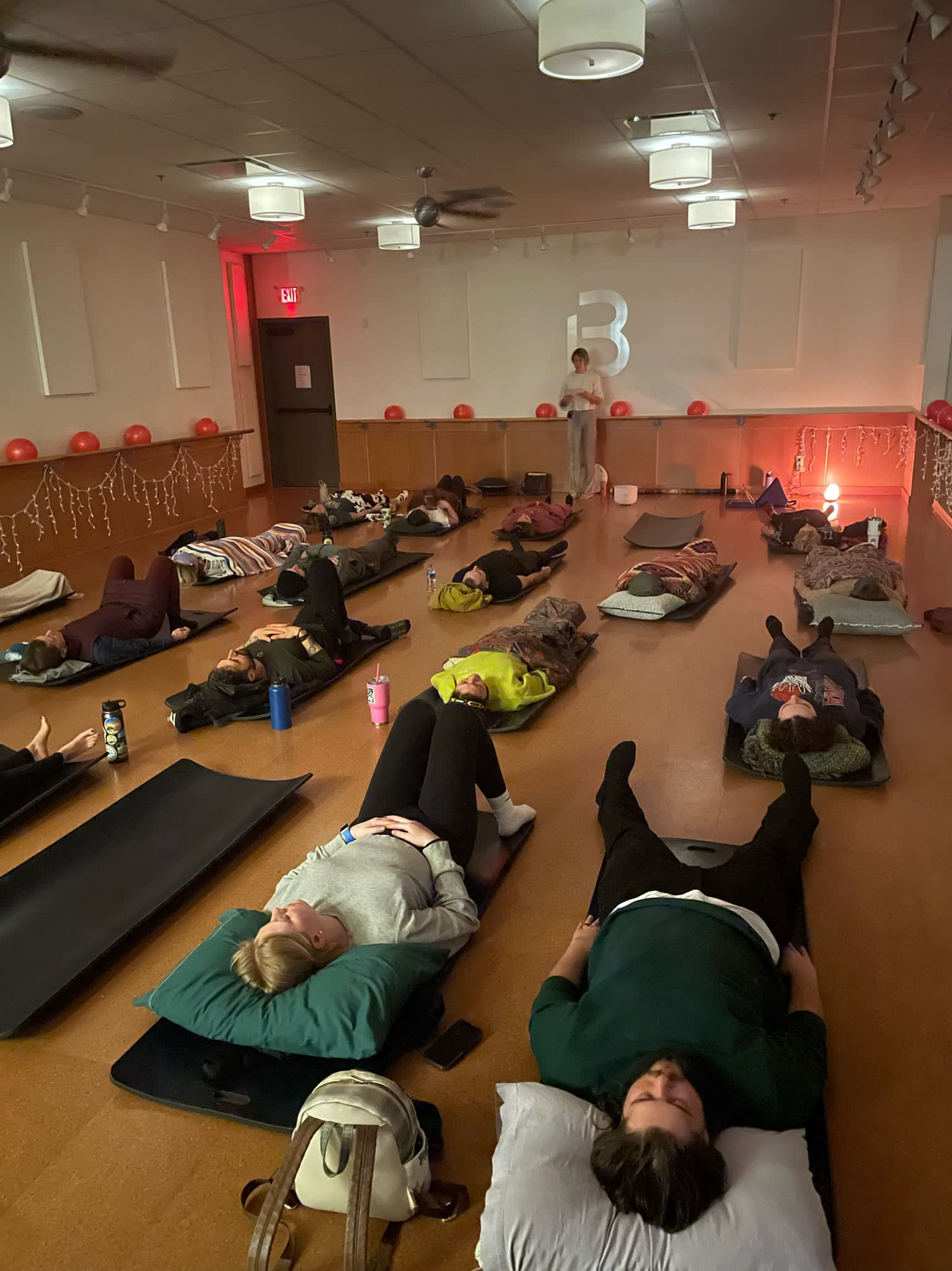 A Liquid Breathwork training class in ambient light