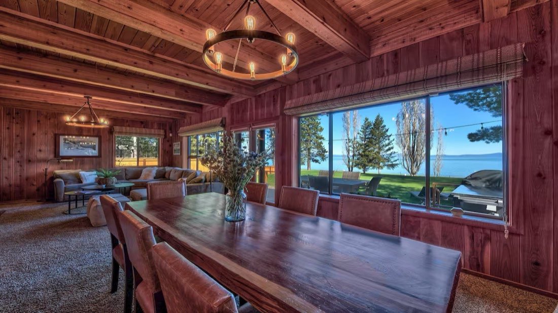 Open living and dining area overlooking Lake Tahoe at the retreat cabin