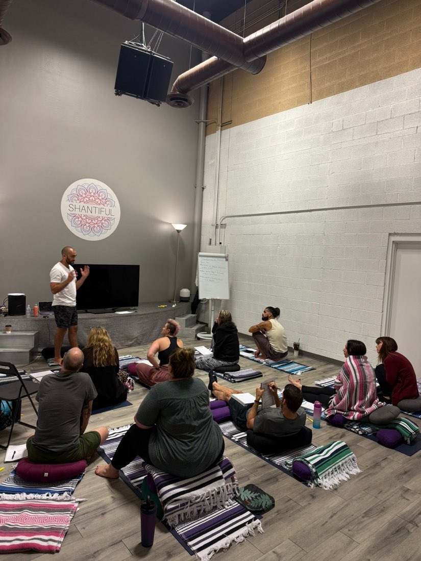 Ryan McBurney teaching a Liquid Breathwork facilitator training circle to students